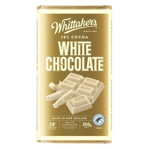 Whittaker’s White Chocolate 28% Cocoa – Smooth & Sweet, a gold and white tin of white chocolate bars from New Zealand with the Whittaker’s logo and chocolate pieces on the front. Whittaker’s White Chocolate 28% Cocoa – Smooth & Sweet, a gold and white tin of white chocolate bars from New Zealand with the Whittaker’s logo and chocolate pieces on the front.