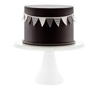 Pettinice Black Fondant, a 250g package of smooth black fondant for cake decorating displayed on a cake stand with decorative banners. Pettinice Black Fondant, a 250g package of smooth black fondant for cake decorating displayed on a cake stand with decorative banners.