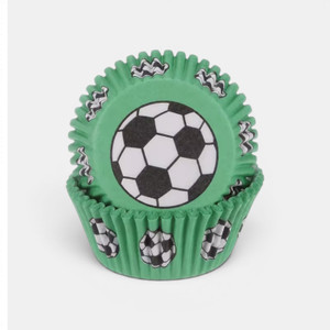 Green soccer cupcake cases featuring black and white football designs for sports-themed baking