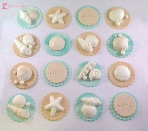 Beach theme fondant cupcake toppers. Set of 12 Beach theme fondant cupcake toppers. Set of 12