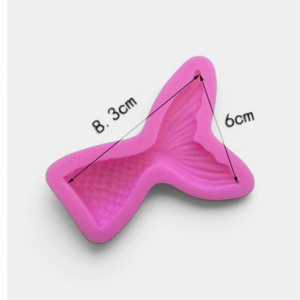 Medium silicone mermaid tail mould with detailed fish scales and fin measuring approximately 8.3cm x 6cm.