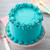 VIVID professional edible teal food colouring bottle with teal buttercream sample