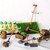 Miniature garden cake decoration set with tiny vegetables, basket and garden tools