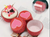 Valentines Day baking cups with red and pink heart designs for cupcakes