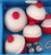 The Cake Mixer Handmade Fondant Fishing Cake Decorations, set of fishing-themed cake toppers including fishing bobbers with red and white fondant design.