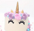Gold unicorn cake topper set with horn ears lashes and sticks for decorating cakes