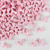 Pink edible mermaid tail sprinkles with pearlescent finish for mermaid themed cake decorating