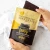 Remarkable 53% dark chocolate bark with salted caramel brittle and spicy ginger in a 125g resealable pouch