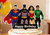 Justice League Happy Birthday cake topper featuring superhero characters and birthday message