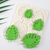 Tropical leaf silicone mould featuring monstera and palm leaf designs for fondant and cake decorating.