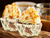 Cowboy cupcake cases with horses, boots, hats, cacti and western designs, 20 cases per pack.