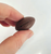 Mini brown rugby ball cake decoration with moulded lace and seam detail for rugby themed birthday cakes
