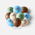 Fishing Balloons 10 Pack with brown green cream and blue balloons featuring black fish designs