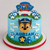 Handmade gumpaste Paw Patrol cake decoration set featuring Paw Patrol logo, paw prints, character face, bones and personalised birthday cake decorations.