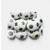 Handmade gumpaste soccer ball cake decorations available in packs of 6 or 12 for football-themed cakes and cupcakes.