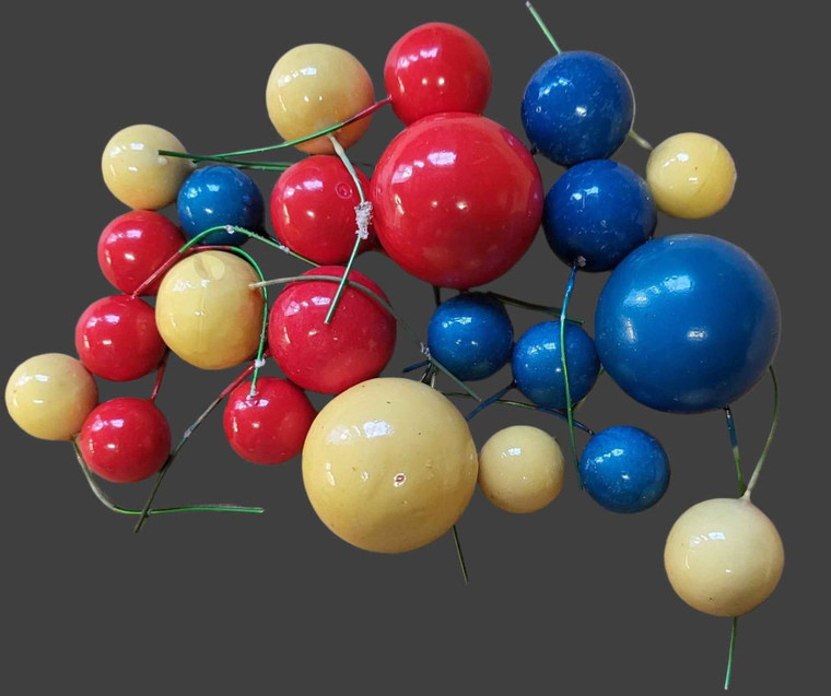 TM Cake Supplies Super Hero Cake Decorating Balls, colorful plastic balls used as cake toppers or decorations for themed cakes.