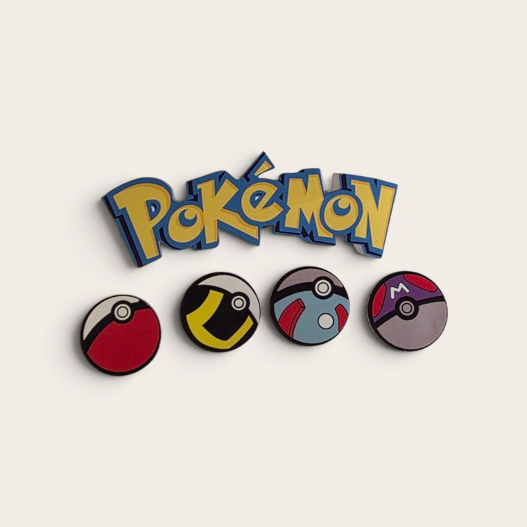 Pokemon cardboard cake topper set with Pokeball decorations