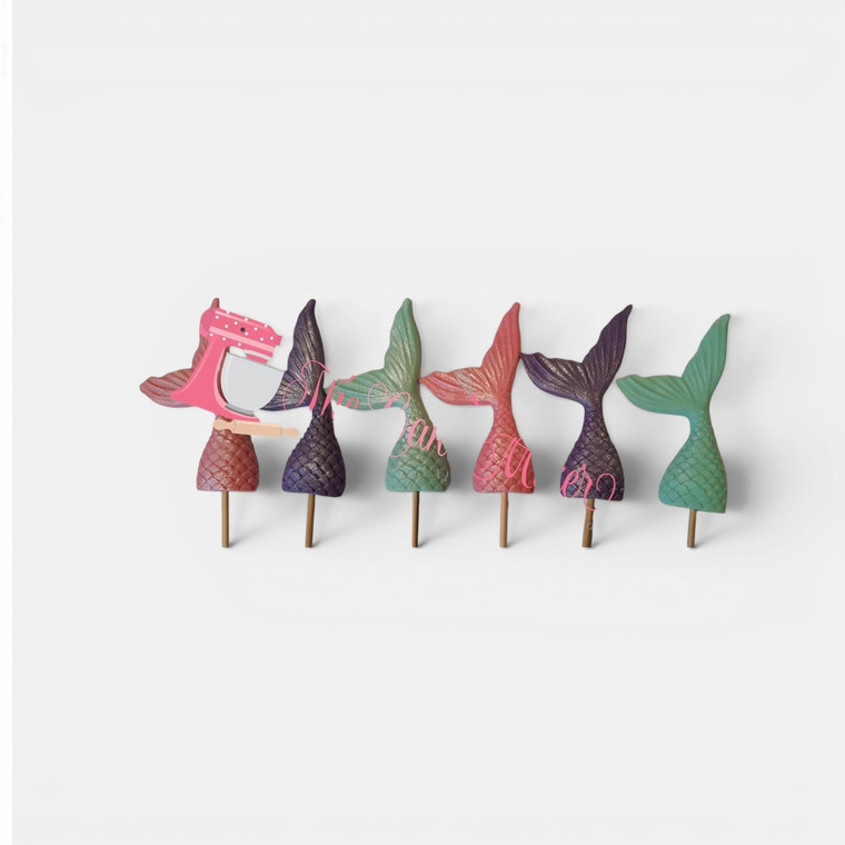 Handmade fondant mermaid tail cake toppers in assorted colours