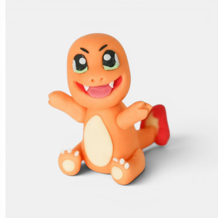 Handmade gumpaste Pokémon cake topper set featuring Pikachu, Charmander and Squirtle for birthday cakes and gaming-themed celebrations.