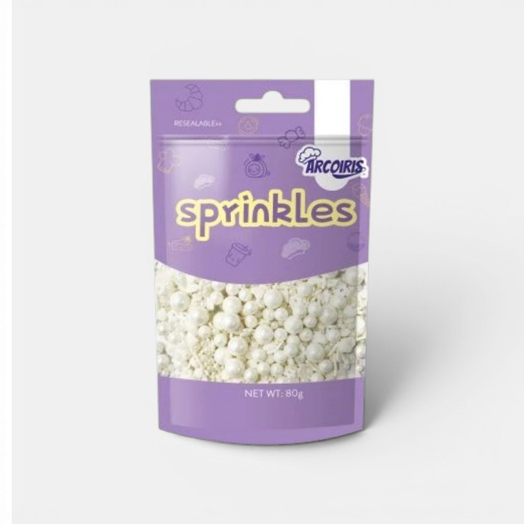 White Bubble Crunch Sprinkles 80g in a resealable pouch, ideal for decorating cakes, cupcakes, cookies and desserts.