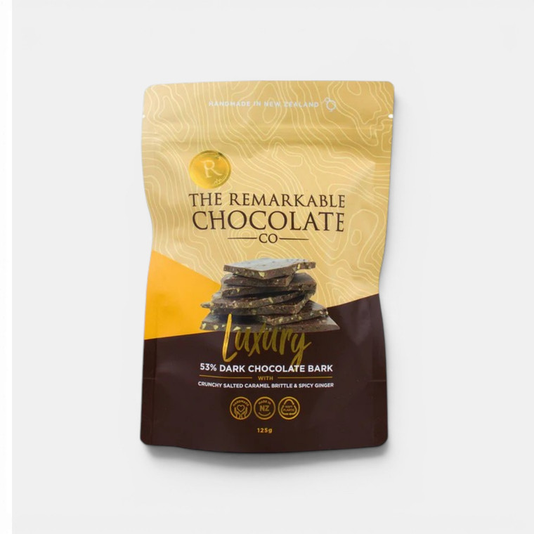 Remarkable 53% dark chocolate bark with salted caramel brittle and spicy ginger in a 125g resealable pouch