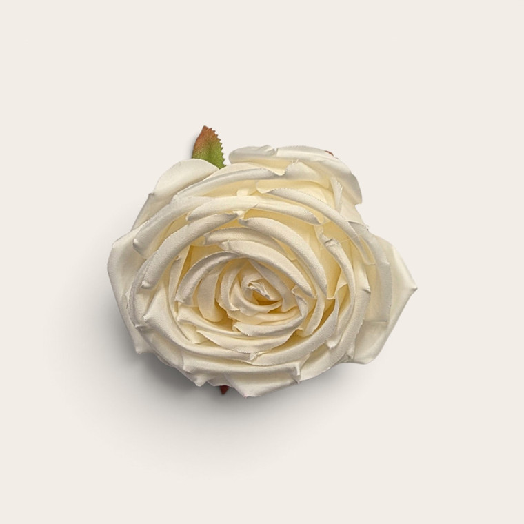 Ivory artificial rose cake decoration approximately 80mm wide with layered fabric petals