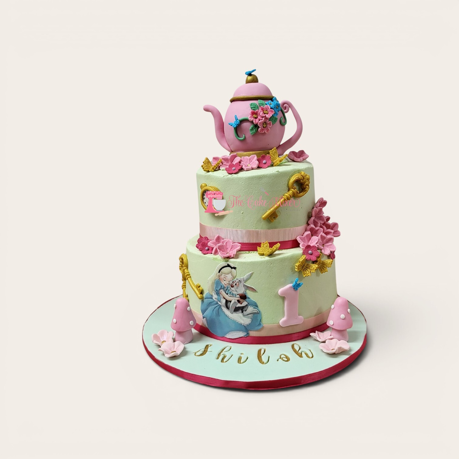 1st birthday alice in wonderland cake 2 tier.jpg