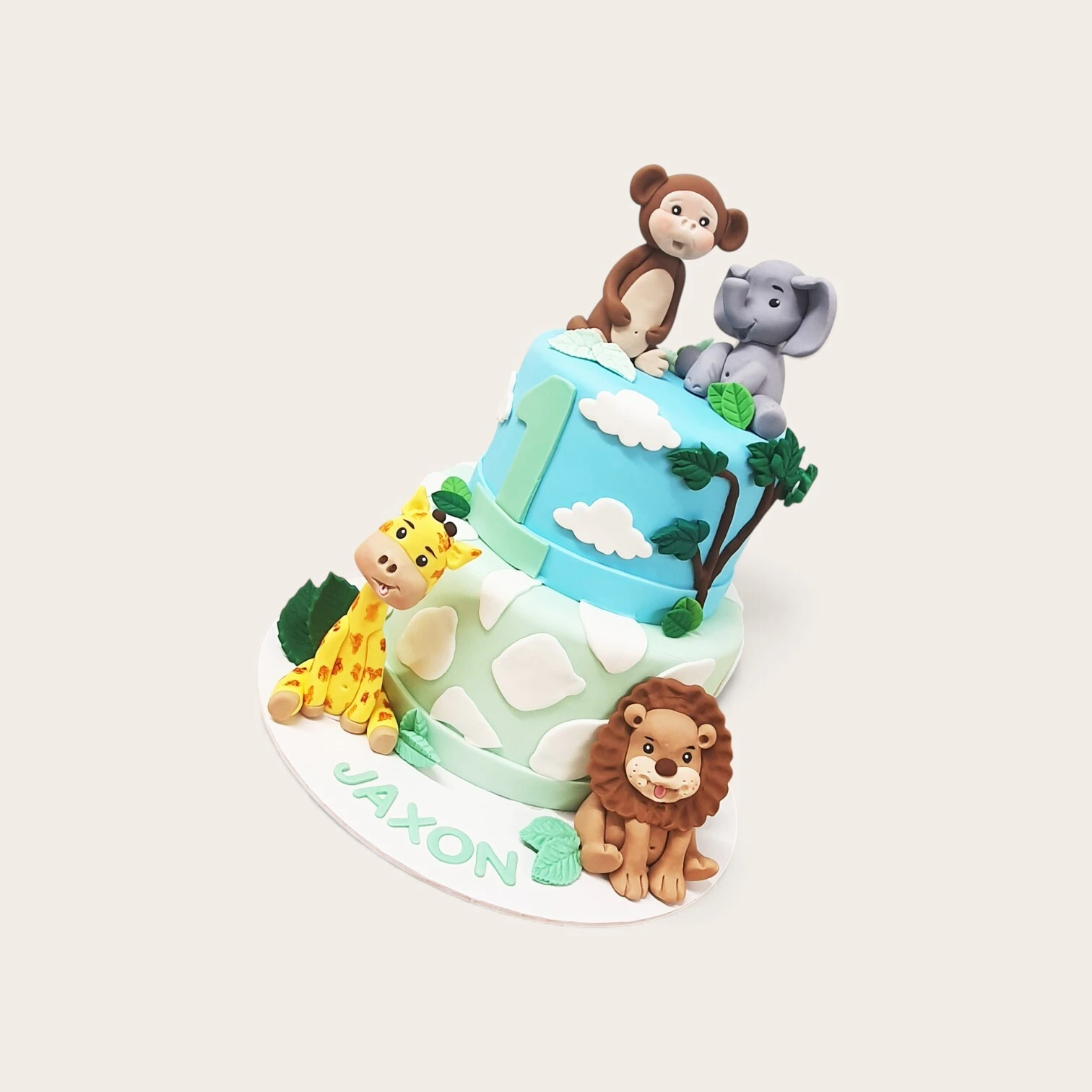 2 tier pastel safari 1st birthday cake.jpg