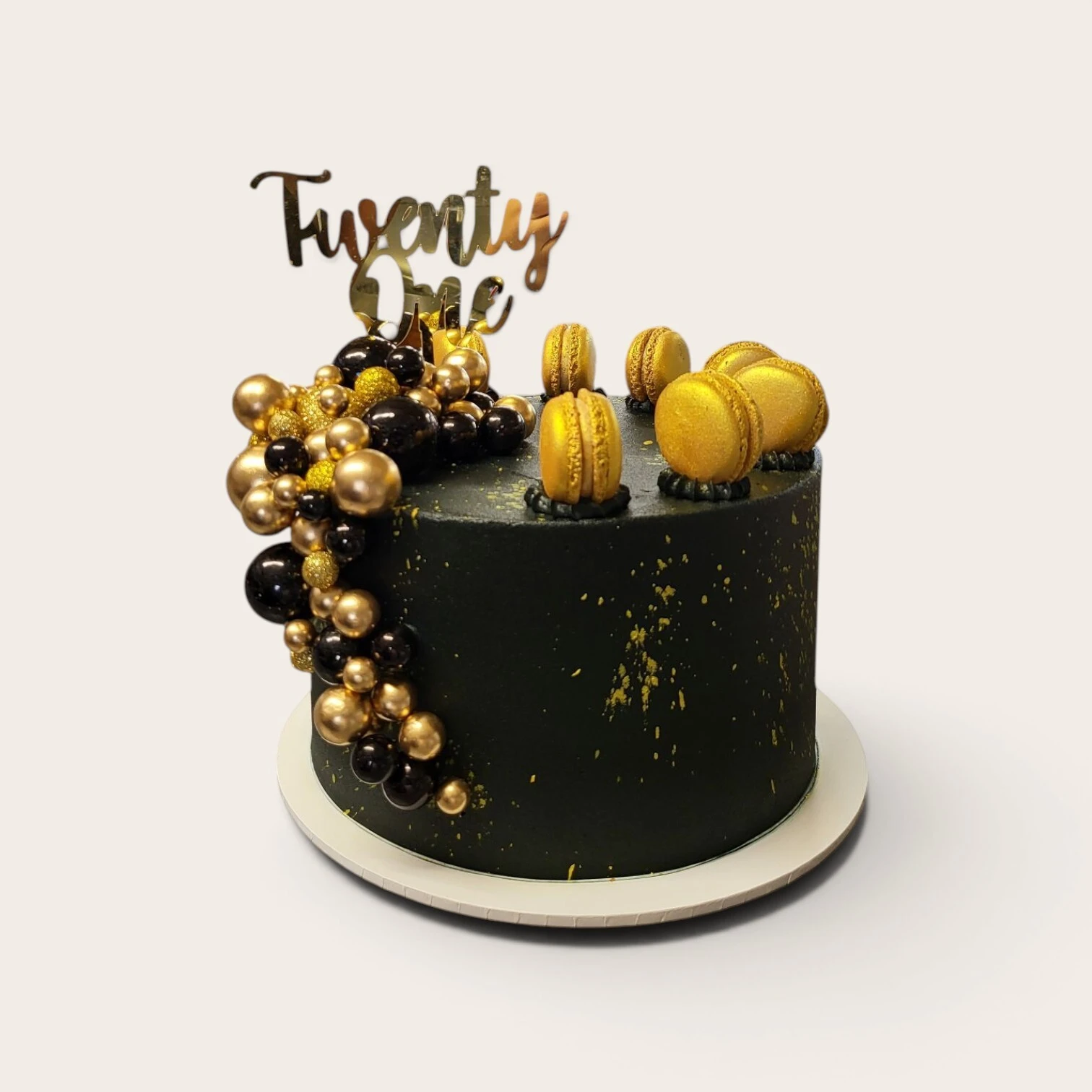 21 black and gold birthday cake.jpg