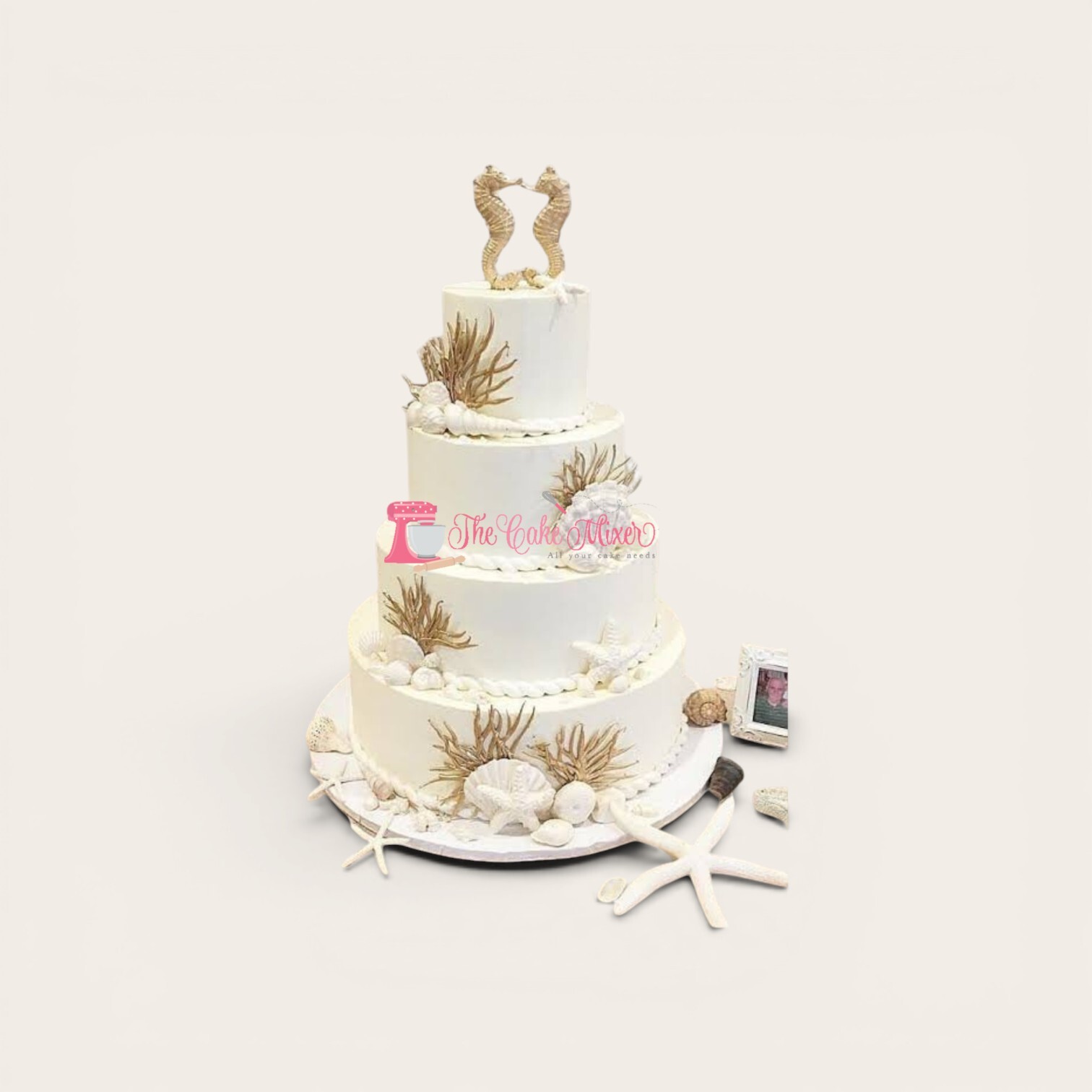 4 tier elegant sea theme birthday cake.jpg