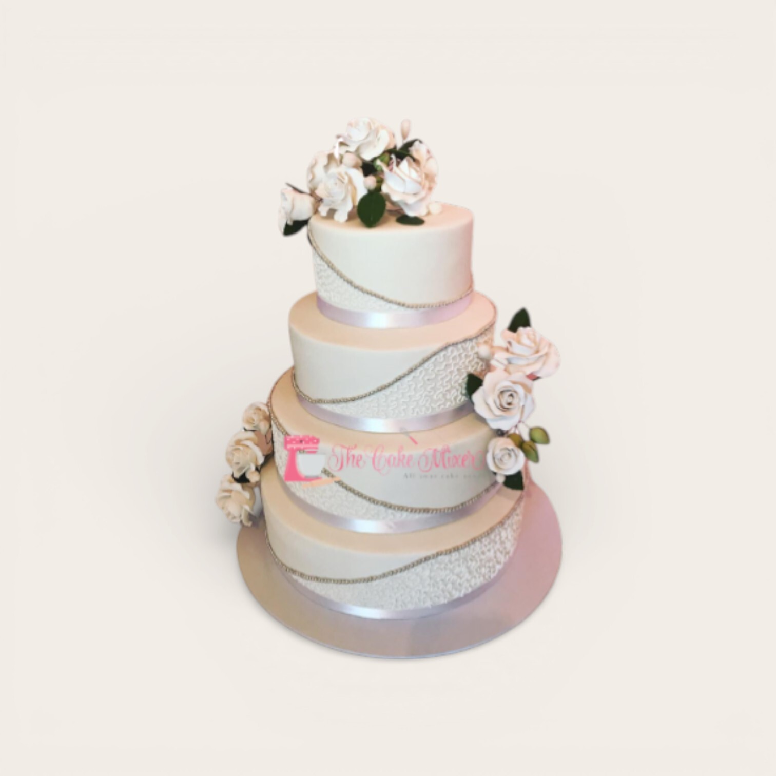 4 tier wedding cake with lace.jpg