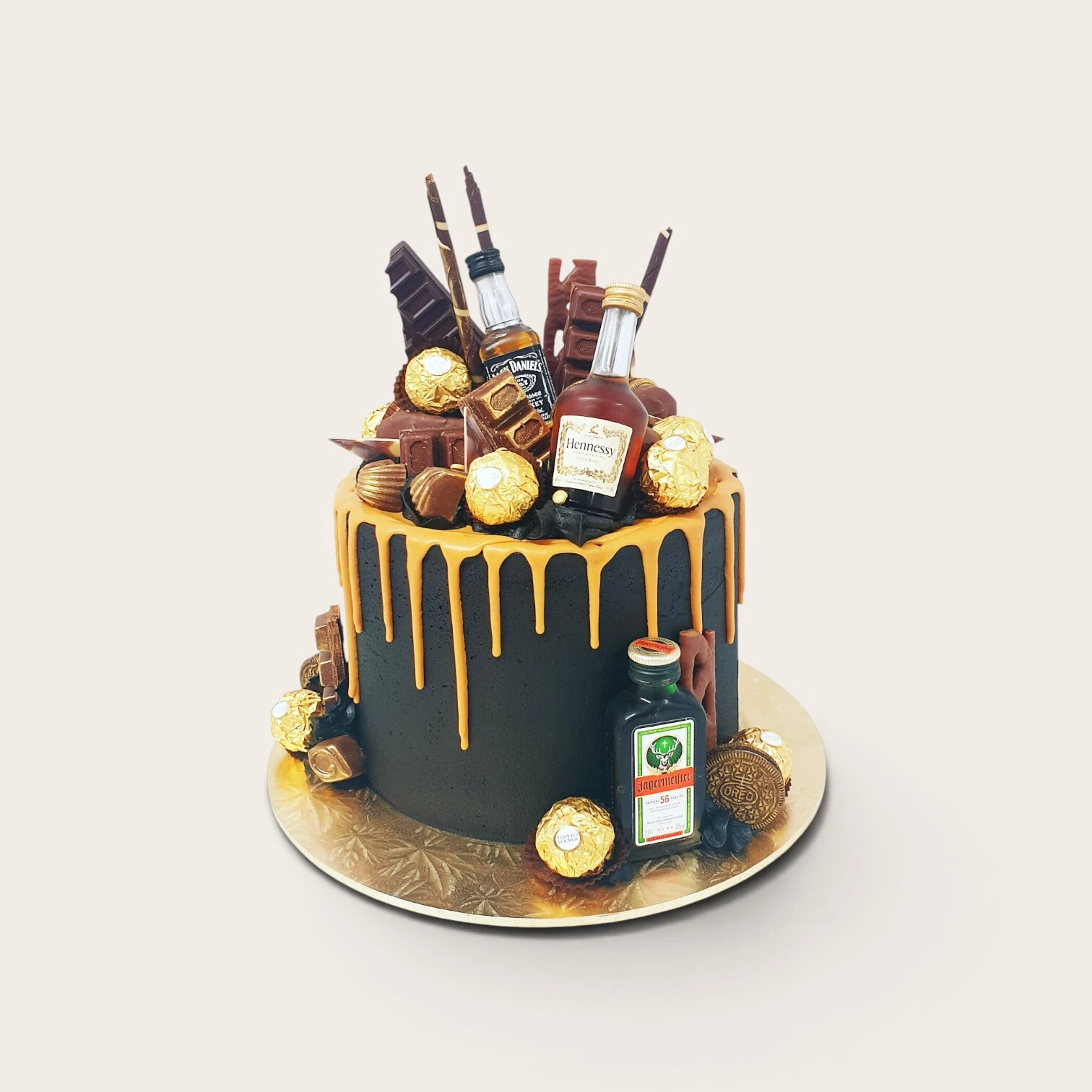 black and gold alcohol bottle cake.jpg