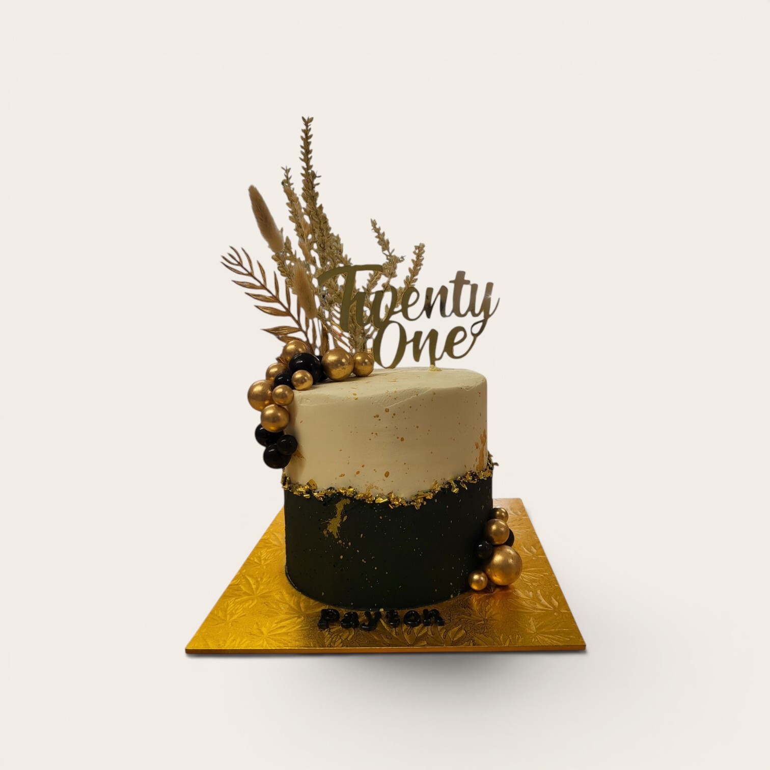 black and gold dried floral cake.jpg