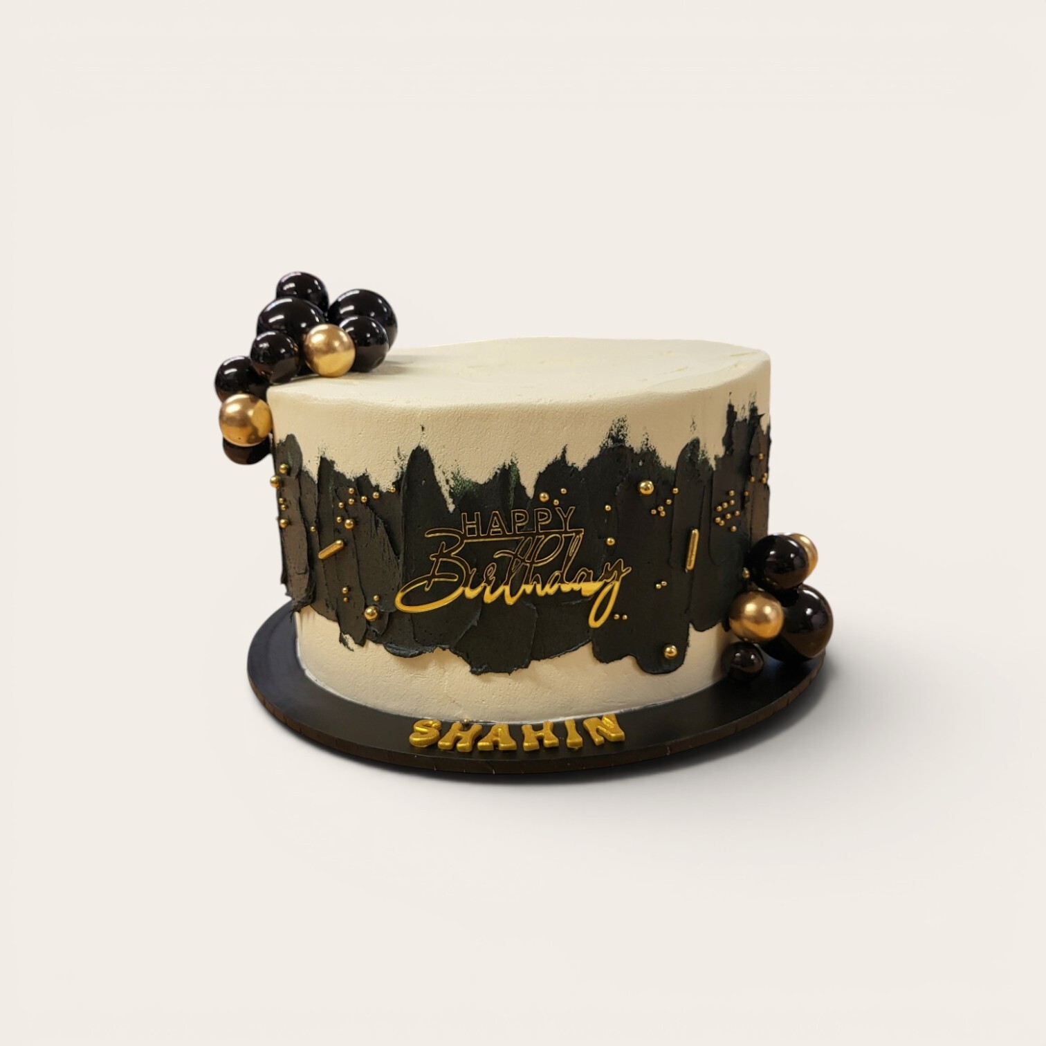 black and white with gold birthday cake.jpg