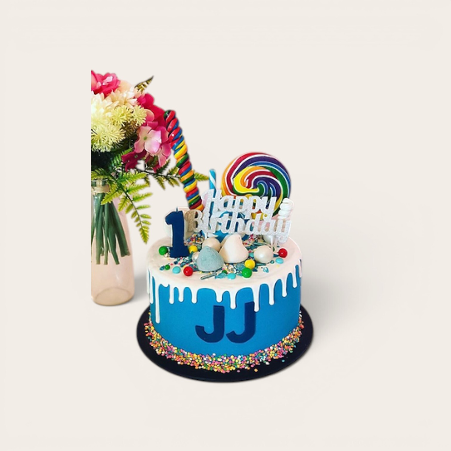 blue cake with white drip.jpg