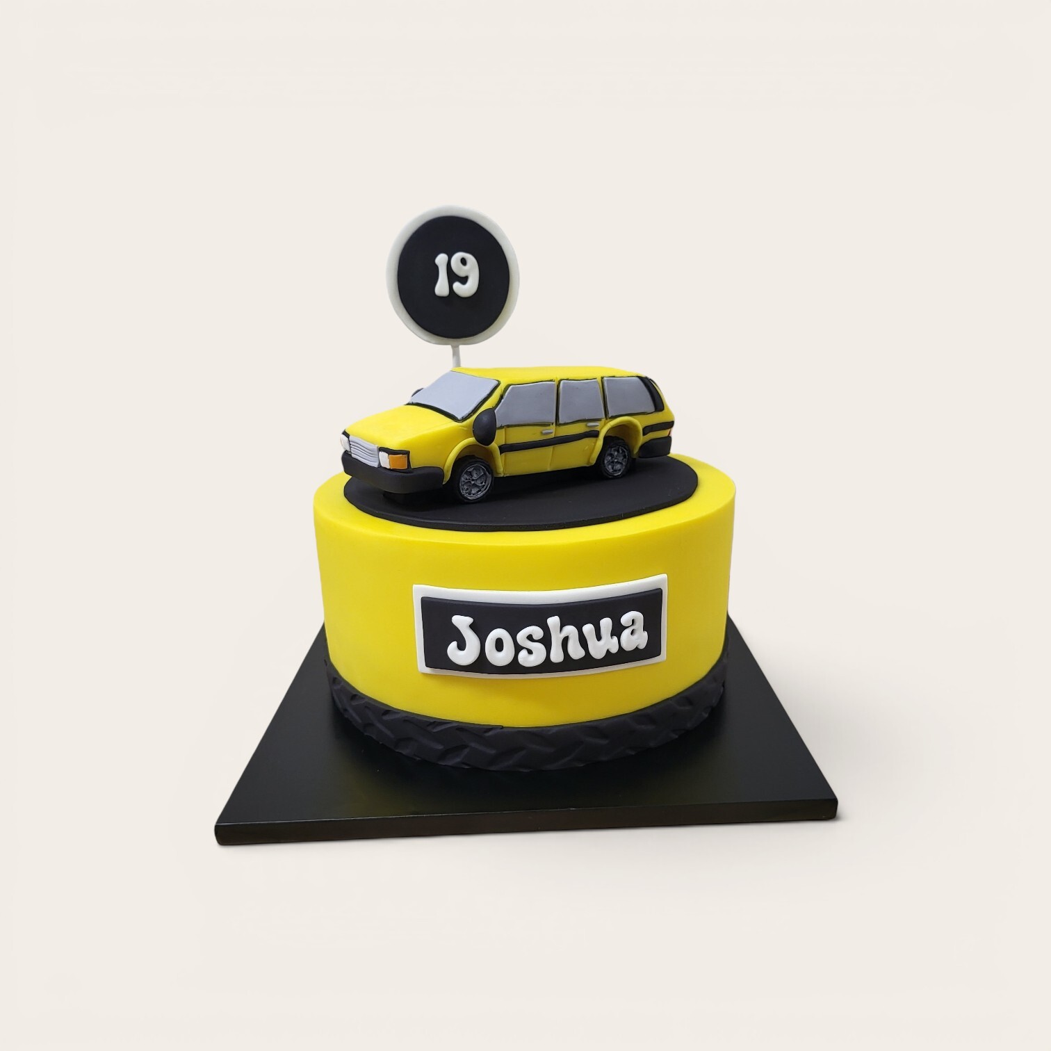 cake with gumpaste vehicle.jpg