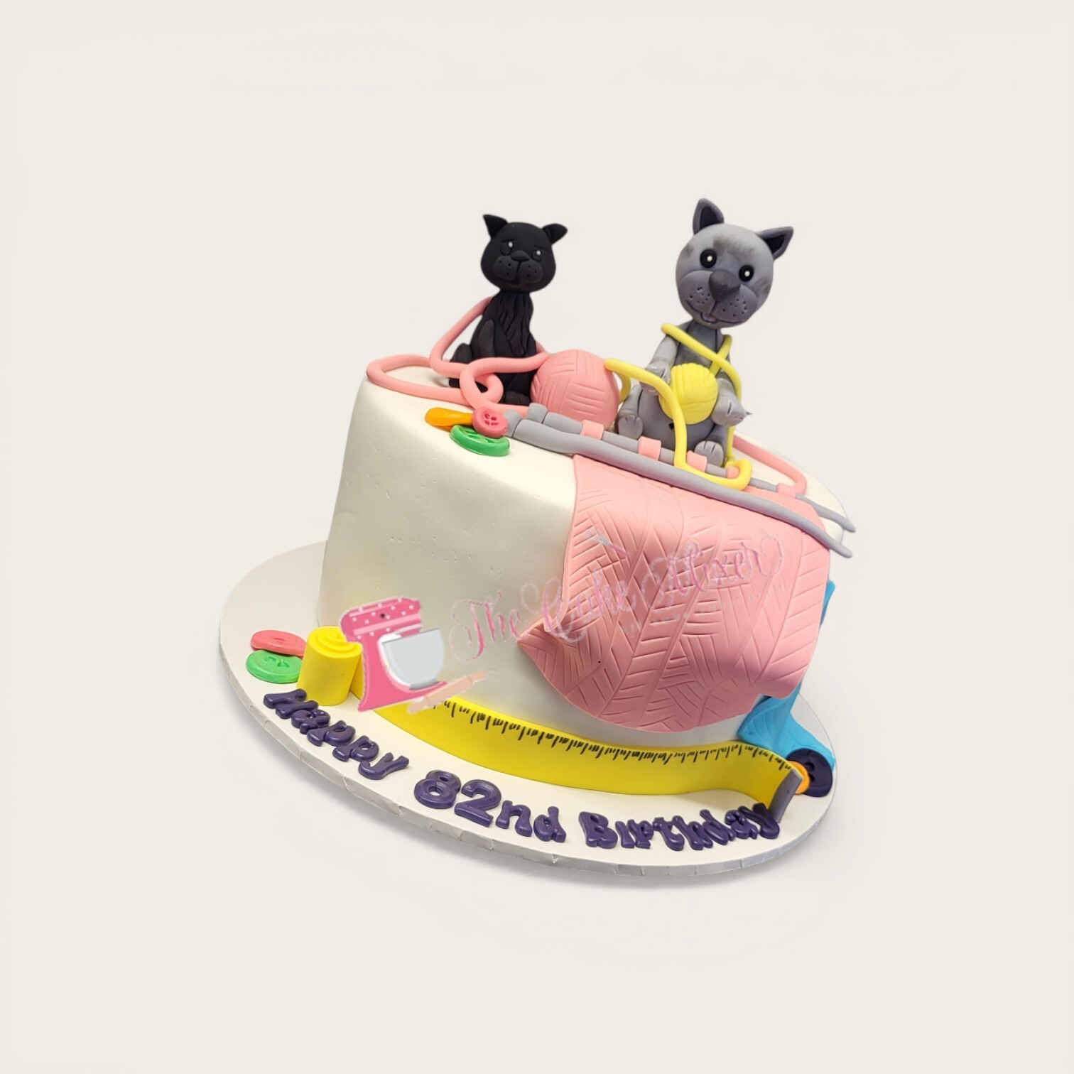 cheeky cats birthday cake.jpg