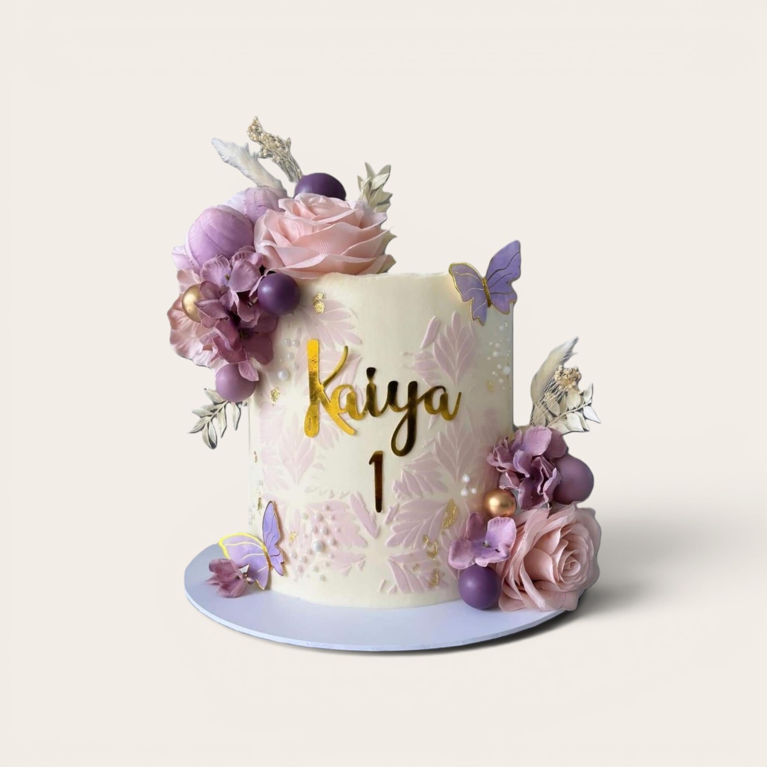 floral 1st birthday cake.jpg