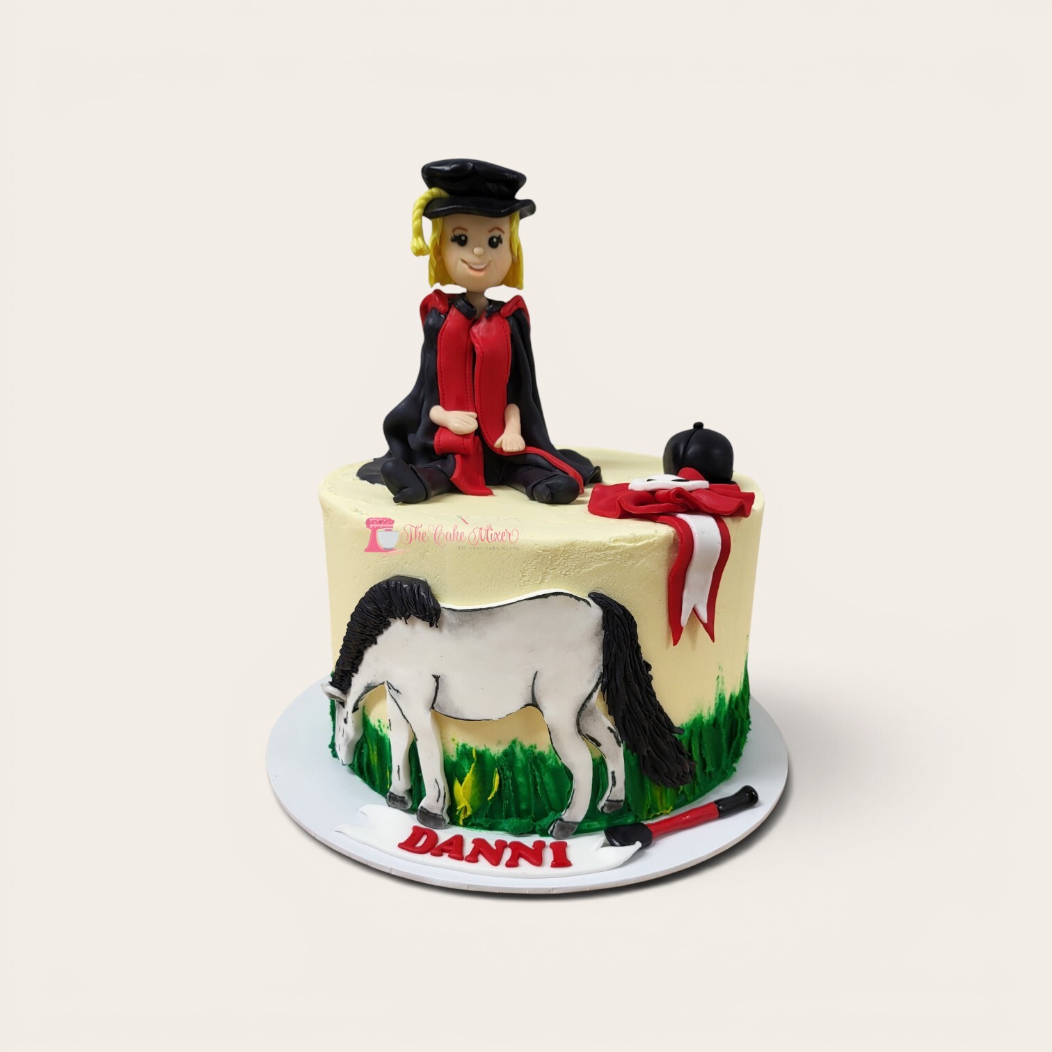 graduation and equestrian cake.jpg
