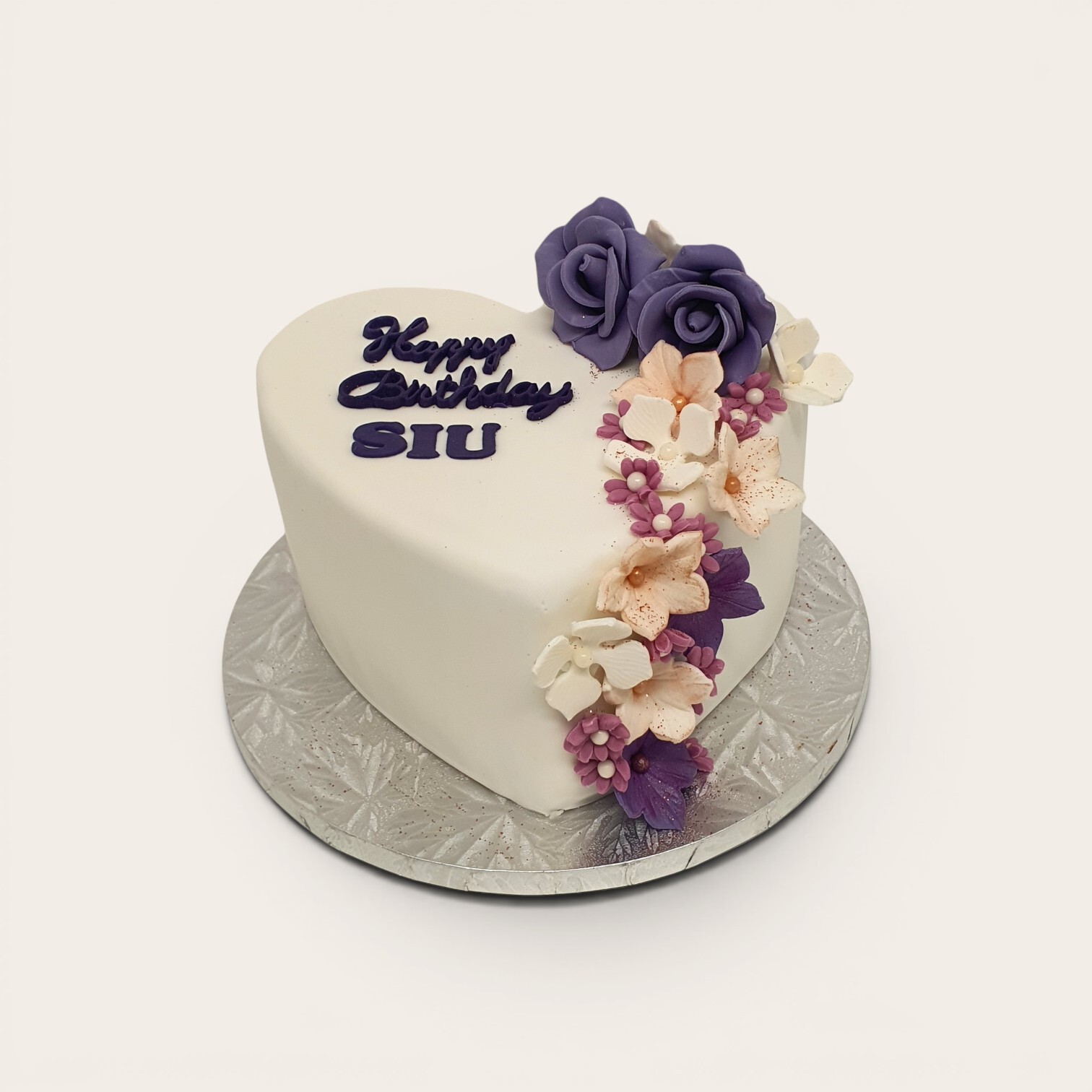 heart birthday cake with flowers.jpg