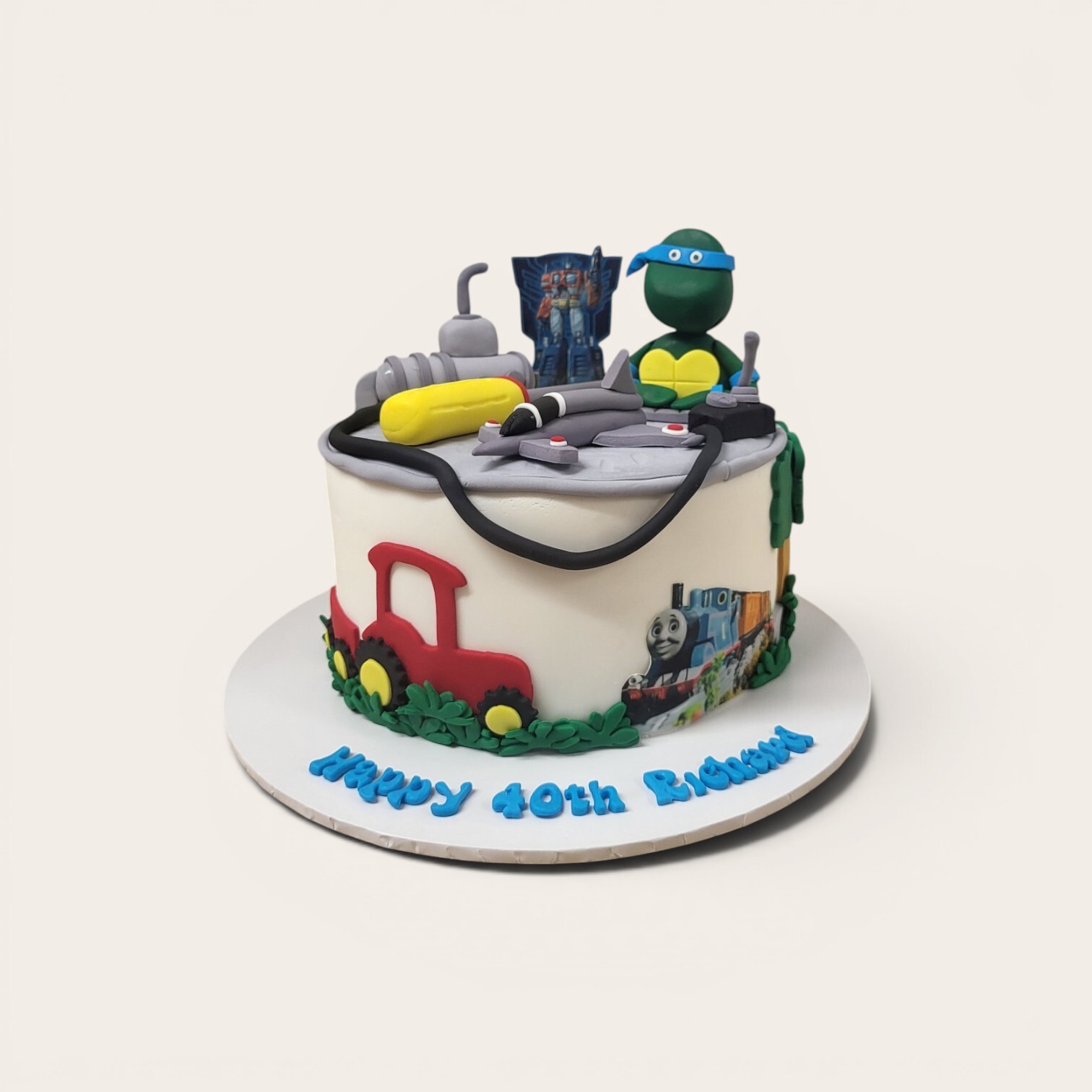 nostalgic child hood toys cake.jpg