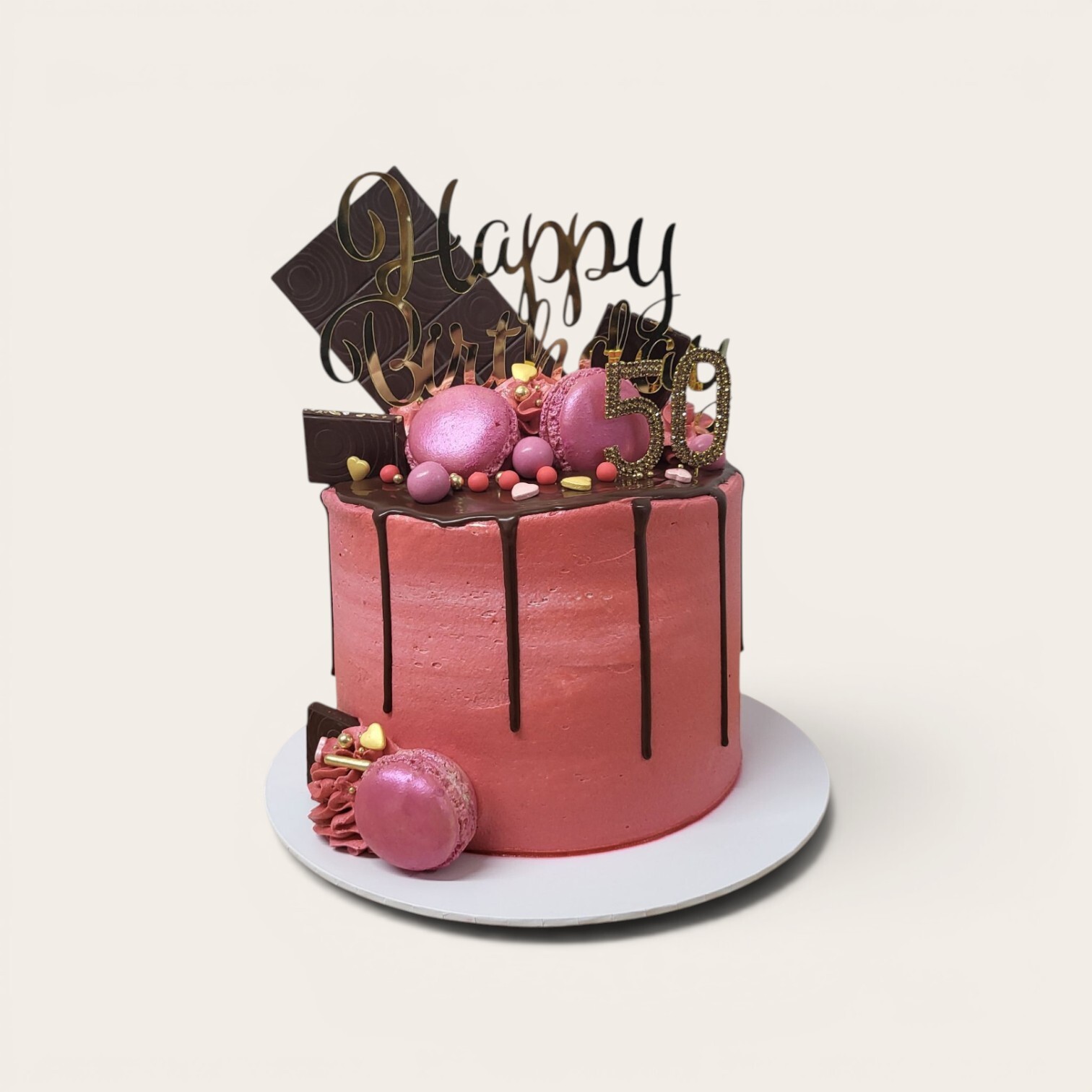 pink birthday cae with choc drip.jpg
