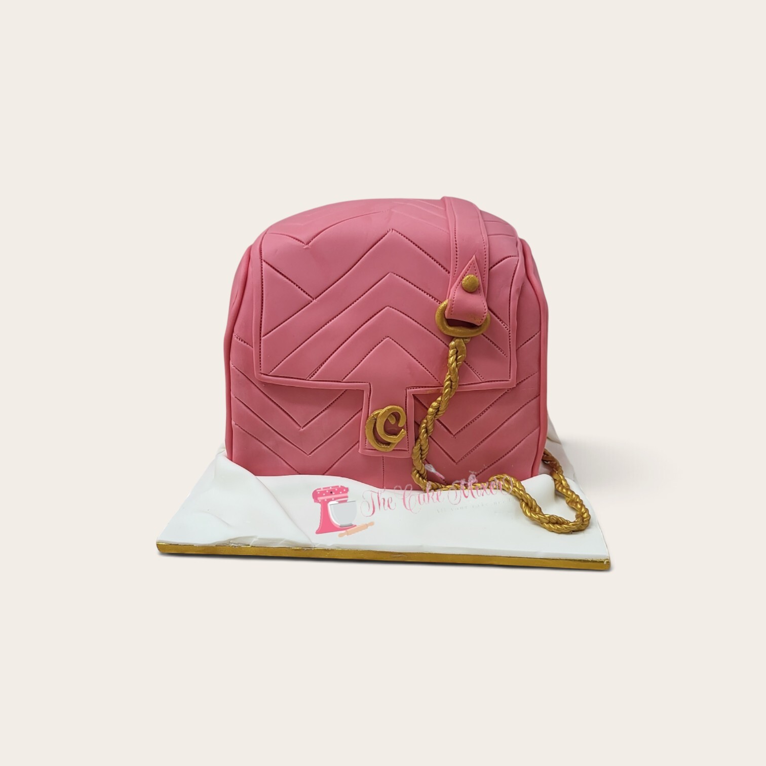 pink handbag shaped cake.jpg