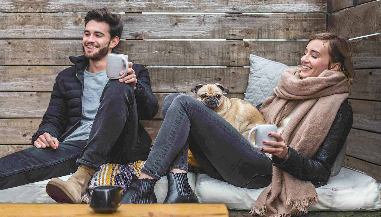 Fun Couple Enjoying High Caliber Coffee®