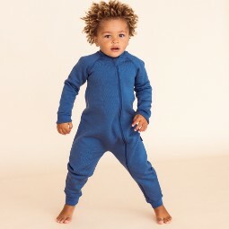 boy-jumping-wearing-a-the-sleep-store-merino-fleece-onesie-denim.jpg