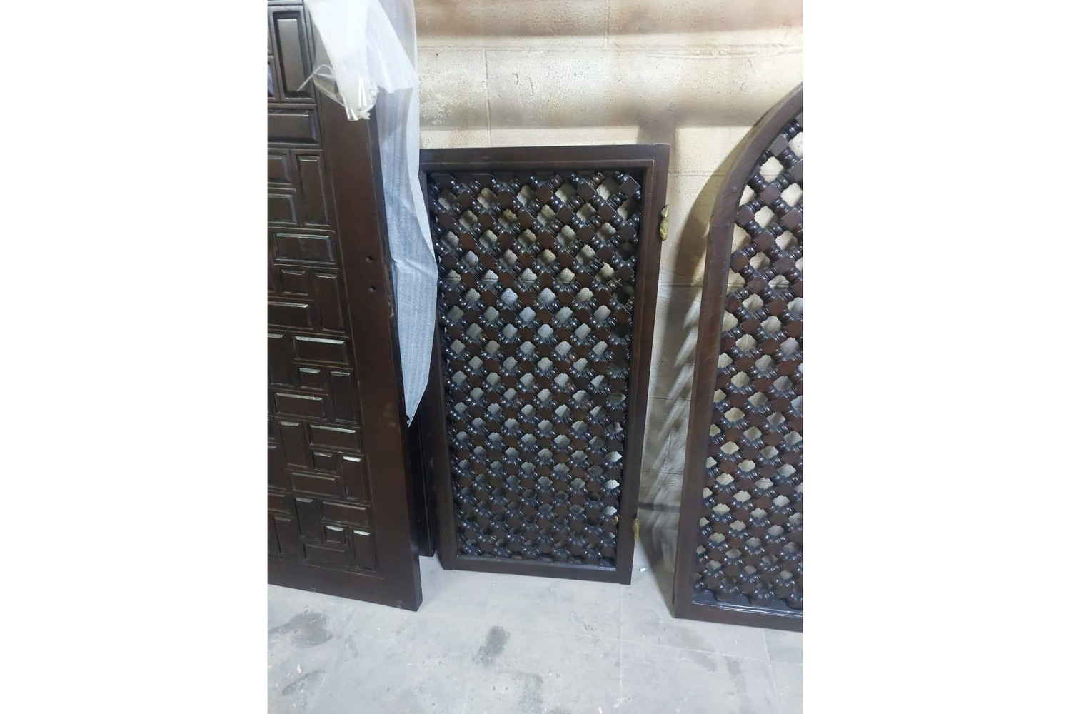 Coffered geometric cabinet door in hand-cut solid wood