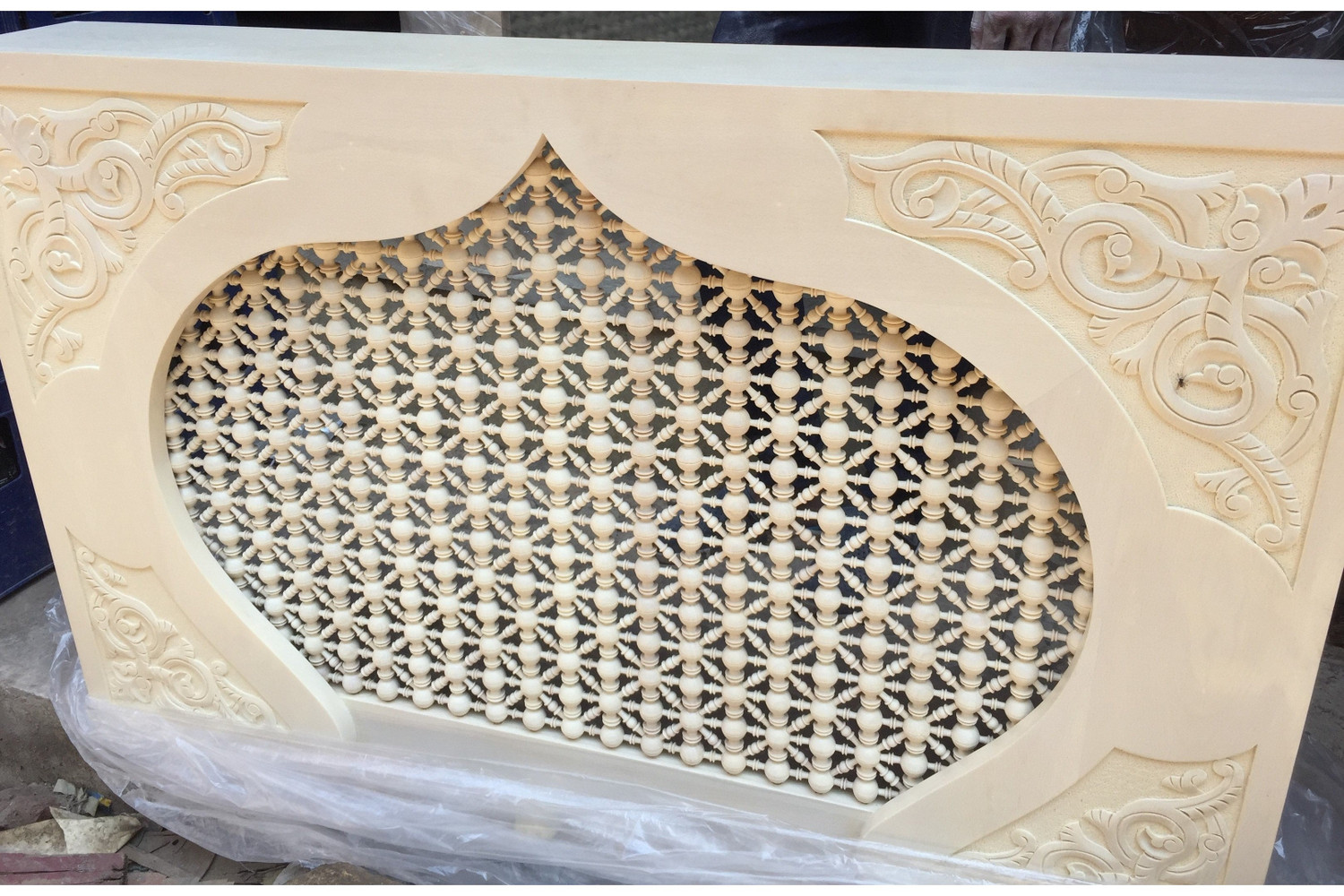 Mashrabiya radiator cover in hand-cut solid wood