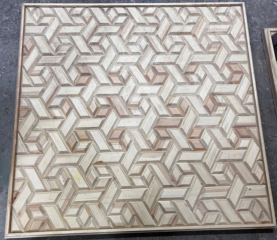 Interlocking geometric wood mosaic panel in hand-cut pine marquetry