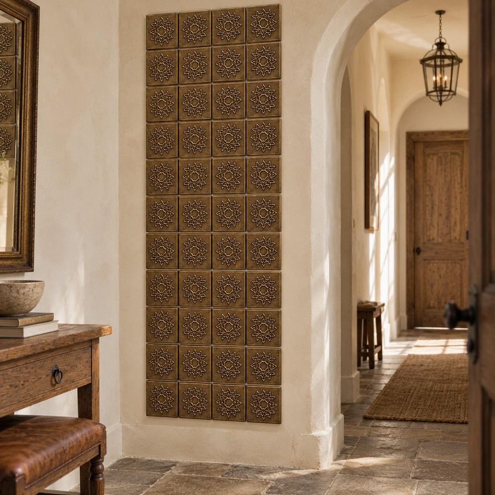 Sun Star Knot Celtic knot tiles in hand-embossed brass, as a tall vertical panel beside an arched doorway in a hallway