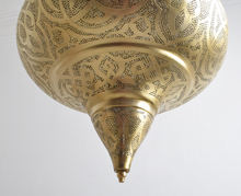 Elegant brass pendant lighting fixture for kitchen island, stylish ceiling light for hallway or dining room decor.